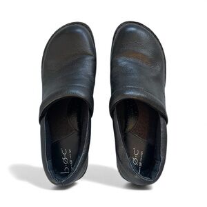Black leather clogs with a slip-on design and a chunky heel by B.O.C. size 10